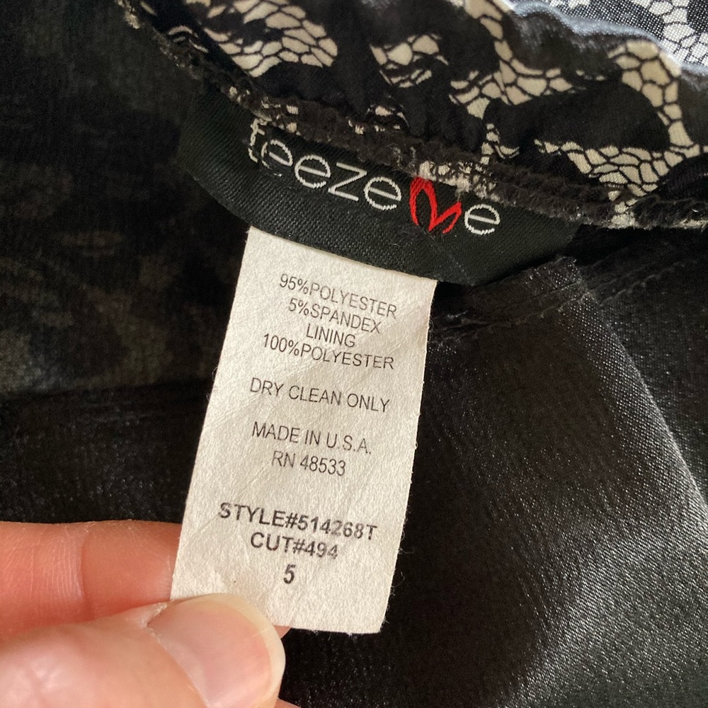 Strapless cocktail dress with sash.